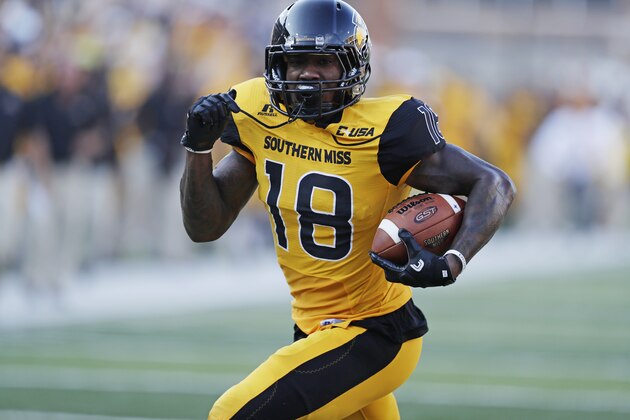 Southern Mississippi wide receiver Korey Robertson (18) sprints away from an unseen Kentucky defender for a 26-yard touchdown pass reception during the second half of an NCAA college football game in Hattiesburg, Miss., Saturday, Sept. 2, 2017. Kentucky won 24-17. (AP Photo/Rogelio V. Solis)