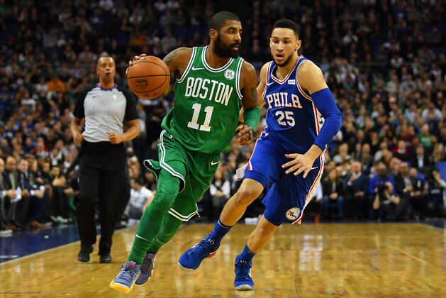 LONDON, ENGLAND - JANUARY 11:  Kyrie Irving #11 of the Boston Celtics holds off Ben Simmons #25 of the Philadelphia 76ers during the NBA game between Boston Celtics and Philadelphia 76ers at The O2 Arena on January 11, 2018 in London, England. (Photo by Dan Mullan/Getty Images)