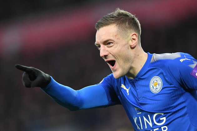Leicester City's English striker Jamie Vardy celebrates scoring the team's first goal during the English Premier League football match between Liverpool and Leicester at Anfield in Liverpool, north west England on December 30, 2017. / AFP PHOTO / Paul ELLIS / RESTRICTED TO EDITORIAL USE. No use with unauthorized audio, video, data, fixture lists, club/league logos or 'live' services. Online in-match use limited to 75 images, no video emulation. No use in betting, games or single club/league/player publications.  /         (Photo credit should read PAUL ELLIS/AFP/Getty Images)