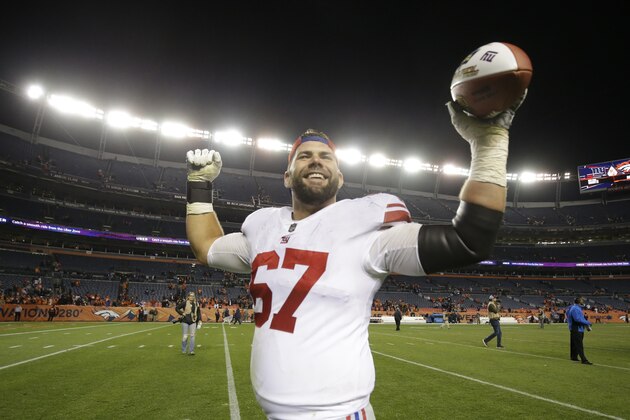 New York Giants offensive guard Justin Pugh celebrates after defeating the Denver Broncos in an NFL football game Sunday, Oct. 15, 2017, in Denver. (AP Photo/Jack Dempsey)
