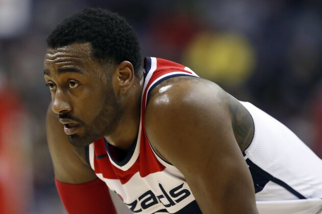 Washington Wizards guard John Wall (2) pauses on the court during the second half of an NBA basketball game against the Utah Jazz, Wednesday, Jan. 10, 2018, in Washington. The Jazz won 107-104. (AP Photo/Alex Brandon)
