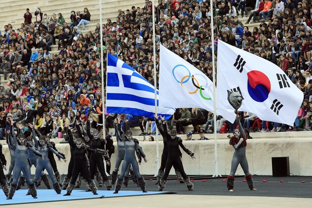 ATHENS, GREECE - OCTOBER 31:Dancers perform  during a handover ceremony for the Olympic Flame at Panathenaic stadium in Athens, on Tuesday, Oct. 31, 2017. (Photo by Milos Bicanski/Getty Images)