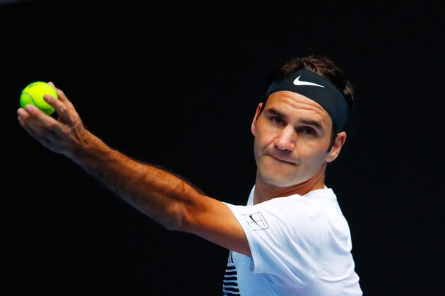 MELBOURNE, AUSTRALIA - JANUARY 13:  Roger Federer of Switzerland serves during a practice session ahead of the 2018 Australian Open at Melbourne Park on January 13, 2018 in Melbourne, Australia.  (Photo by Scott Barbour/Getty Images)