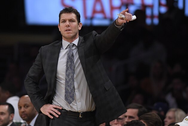Los Angeles Lakers head coach Luke Walton gestures during the second half of a basketball game against the Atlanta Hawks, Sunday, Jan. 7, 2018, in Los Angeles. The Lakers won 132-113. (AP Photo/Mark J. Terrill)