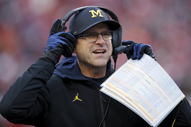 MADISON, WI - NOVEMBER 18: Head coach Jim Harbaugh of the Michigan Wolverines looks on during a game against the Wisconsin Badgers at Camp Randall Stadium on November 18, 2017 in Madison, Wisconsin. Wisconsin won 24-10. (Photo by Joe Robbins/Getty Images)