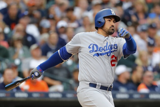 Los Angeles Dodgers' Adrian Gonzalez hits a double against the Detroit Tigers in the second inning of a baseball game in Detroit, Friday, Aug. 18, 2017. (AP Photo/Paul Sancya)