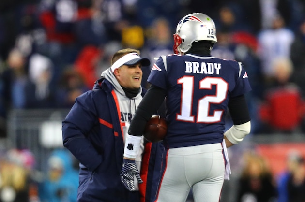 FOXBOROUGH, MA - JANUARY 13:  Tom Brady #12 of the New England Patriots reacts with Offensive Coordinator Josh McDaniels before the AFC Divisional Playoff game against the Tennessee Titans  at Gillette Stadium on January 13, 2018 in Foxborough, Massachusetts.  (Photo by Maddie Meyer/Getty Images)