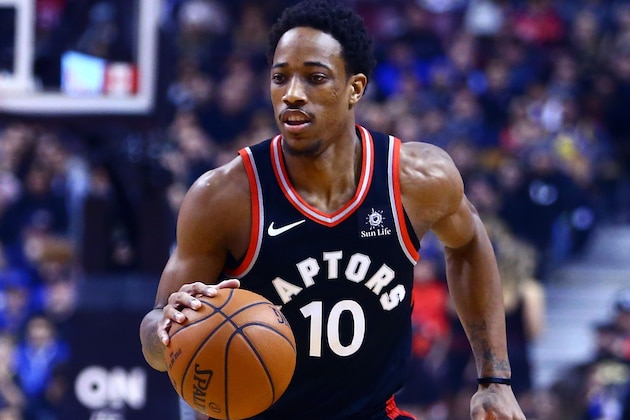 TORONTO, ON - JANUARY 13:  DeMar DeRozan #10 of the Toronto Raptors dribbles the ball during the first half of an NBA game against the Golden State Warriors at Air Canada Centre on January 13, 2018 in Toronto, Canada.  NOTE TO USER: User expressly acknowledges and agrees that, by downloading and or using this photograph, User is consenting to the terms and conditions of the Getty Images License Agreement.  (Photo by Vaughn Ridley/Getty Images)