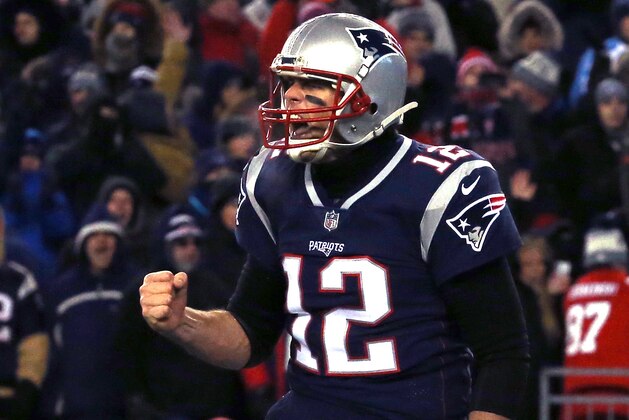 FOXBOROUGH, MA - JANUARY 13:  Tom Brady #12 of the New England Patriots reacts after a touchdown in the third quarter of the AFC Divisional Playoff game against the Tennessee Titans at Gillette Stadium on January 13, 2018 in Foxborough, Massachusetts.  (Photo by Jim Rogash/Getty Images)