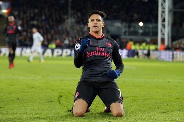 Arsenal's Alexis Sanchez celebrates after scoring his side's second goal of the game during their English Premier League soccer match between Crystal Palace and Arsenal at Selhurst Park stadium in London, Thursday, Dec. 28, 2017. (AP Photo/Alastair Grant)