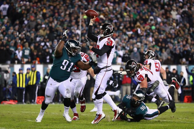 PHILADELPHIA, PA - JANUARY 13: Cornerback Robert Alford #23 of the Atlanta Falcons throws a pass against defensive tackle Fletcher Cox #91 of the Philadelphia Eagles during the second quarter in the NFC Divisional Playoff game at Lincoln Financial Field on January 13, 2018 in Philadelphia, Pennsylvania.  (Photo by Al Bello/Getty Images)
