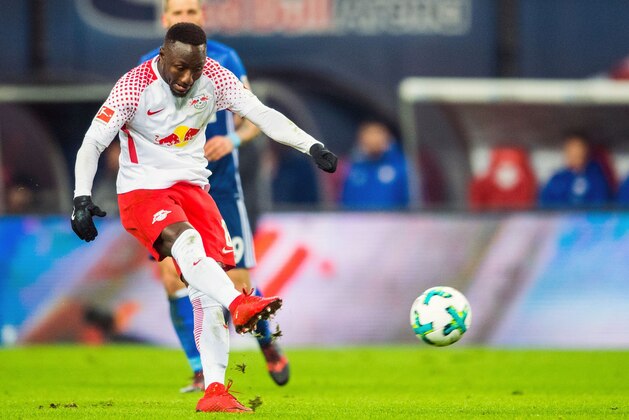 Leipzig´s Guinean midfielder Naby Keita scores the opening goal during the German first division Bundesliga football match between RB Leipzig and FC Schalke 04 in Leipzig, eastern germany on January 13, 2018. / AFP PHOTO / ROBERT MICHAEL / RESTRICTIONS: DURING MATCH TIME: DFL RULES TO LIMIT THE ONLINE USAGE TO 15 PICTURES PER MATCH AND FORBID IMAGE SEQUENCES TO SIMULATE VIDEO. == RESTRICTED TO EDITORIAL USE == FOR FURTHER QUERIES PLEASE CONTACT DFL DIRECTLY AT + 49 69 650050
 / RESTRICTIONS: DURING MATCH TIME: DFL RULES TO LIMIT THE ONLINE USAGE TO 15 PICTURES PER MATCH AND FORBID IMAGE SEQUENCES TO SIMULATE VIDEO. == RESTRICTED TO EDITORIAL USE == FOR FURTHER QUERIES PLEASE CONTACT DFL DIRECTLY AT + 49 69 650050
ALTERNATIVE CROP        (Photo credit should read ROBERT MICHAEL/AFP/Getty Images)