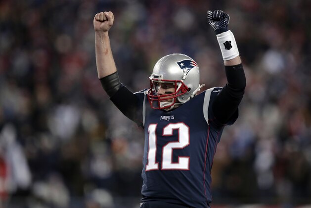 New England Patriots quarterback Tom Brady celebrates a touchdown by James White during the first half of an NFL divisional playoff football game against the Tennessee Titans, Saturday, Jan. 13, 2018, in Foxborough, Mass. (AP Photo/Charles Krupa)