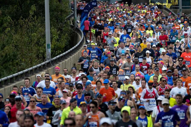 Runners enter Brooklyn after crossing the Verrazano-Narrows Bridge during the New York City Marathon on Sunday, Nov. 5, 2017, in New York. (AP Photo/Craig Ruttle)