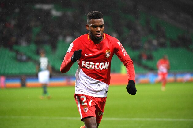 Monacos French midfielder Thomas Lemar (C) celebrates after scoring a goal during the French L1 football match between Saint-Etienne (ASSE) and Monaco (ASM) on December 15, 2017, at the Geoffroy Guichard stadium in Saint-Etienne, central-eastern France.  / AFP PHOTO / ROMAIN LAFABREGUE        (Photo credit should read ROMAIN LAFABREGUE/AFP/Getty Images)