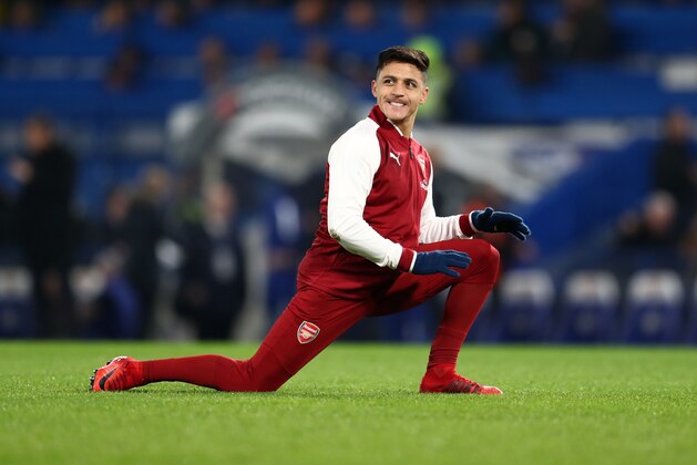 LONDON, ENGLAND - JANUARY 10: Alexis Sanchez of Arsenal warms up before the Carabao Cup Semi-Final First Leg match between Chelsea and Arsenal at Stamford Bridge on January 10, 2018 in London, England. (Photo by Catherine Ivill/Getty Images)