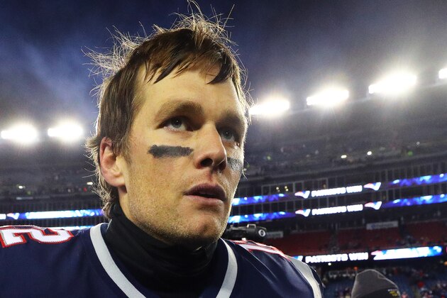 FOXBOROUGH, MA - JANUARY 13: Tom Brady #12 of the New England Patriots exits the field after the AFC Divisional Playoff game at Gillette Stadium on January 13, 2018 in Foxborough, Massachusetts. (Photo by Maddie Meyer/Getty Images)
