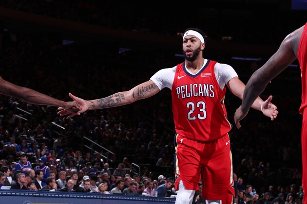 NEW YORK, NY - JANUARY 14:  Anthony Davis #23 of the New Orleans Pelicans high fives his teammates during the game against the New York Knicks on January 14, 2018 at Madison Square Garden in New York City, New York.  NOTE TO USER: User expressly acknowledges and agrees that, by downloading and or using this photograph, User is consenting to the terms and conditions of the Getty Images License Agreement. Mandatory Copyright Notice: Copyright 2018 NBAE  (Photo by Nathaniel S. Butler/NBAE via Getty Images)