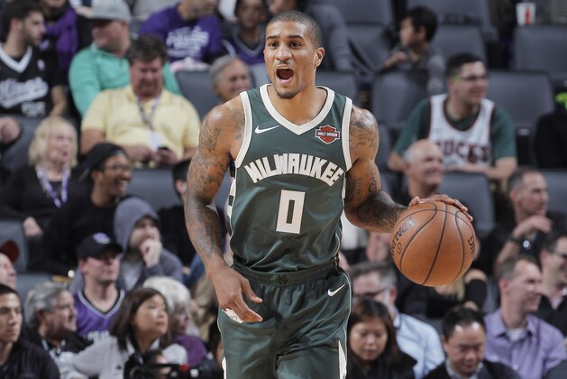 SACRAMENTO, CA - NOVEMBER 28: Gary Payton II #0 of the Milwaukee Bucks brings the ball up the court against the Sacramento Kings on November 28, 2017 at Golden 1 Center in Sacramento, California. NOTE TO USER: User expressly acknowledges and agrees that, by downloading and or using this photograph, User is consenting to the terms and conditions of the Getty Images Agreement. Mandatory Copyright Notice: Copyright 2017 NBAE (Photo by Rocky Widner/NBAE via Getty Images)