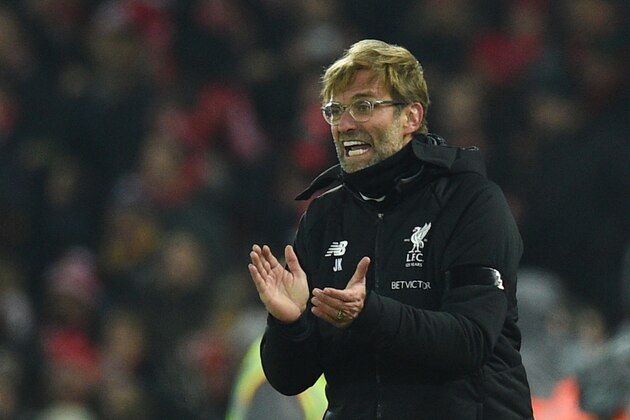 Liverpool's German manager Jurgen Klopp applauds on the touchline during the English Premier League football match between Liverpool and Manchester City at Anfield in Liverpool, north west England on January 14, 2018. / AFP PHOTO / Oli SCARFF / RESTRICTED TO EDITORIAL USE. No use with unauthorized audio, video, data, fixture lists, club/league logos or 'live' services. Online in-match use limited to 75 images, no video emulation. No use in betting, games or single club/league/player publications.  /         (Photo credit should read OLI SCARFF/AFP/Getty Images)