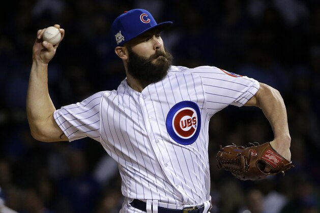 FILE - In this Wednesday, Oct. 18, 201,7 file photo, Chicago Cubs starting pitcher Jake Arrieta throws during the first inning of Game 4 of baseball's National League Championship Series against the Los Angeles Dodgers in Chicago. Cubs pitchers Arrieta and Wade Davis  were among nine free agents who turned down $17.4 million qualifying offers from their teams Thursday, Nov. 16, 2017. (AP Photo/Nam Y. Huh, File)