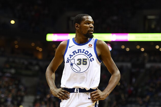 MILWAUKEE, WI - JANUARY 12:  Kevin Durant #35 of the Golden State Warriors walks backcourt during a game during a game against the Milwaukee Bucks at the Bradley Center on January 12, 2018 in Milwaukee, Wisconsin.  NOTE TO USER: User expressly acknowledges and agrees that, by downloading and or using this photograph, User is consenting to the terms and conditions of the Getty Images License Agreement.  (Photo by Stacy Revere/Getty Images)
