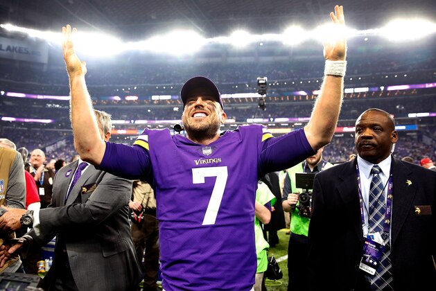 MINNEAPOLIS, MN - JANUARY 14:  Quarterback Case Keenum #7 of the Minnesota Vikings celebrates as he walks off the field after the Vikings defeated the New Orleans Saints 29-24 to win the NFC divisional round playoff game at U.S. Bank Stadium on January 14, 2018 in Minneapolis, Minnesota.  (Photo by Jamie Squire/Getty Images)