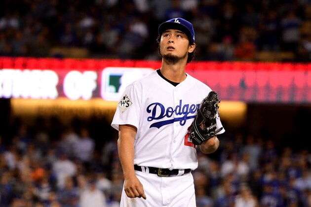 LOS ANGELES, CA - NOVEMBER 01:  Yu Darvish #21 of the Los Angeles Dodgers walks to the dugout after being relieved during the second inning against the Houston Astros in game seven of the 2017 World Series at Dodger Stadium on November 1, 2017 in Los Angeles, California.  (Photo by Harry How/Getty Images)