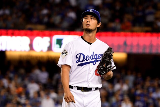 LOS ANGELES, CA - NOVEMBER 01:  Yu Darvish #21 of the Los Angeles Dodgers walks to the dugout after being relieved during the second inning against the Houston Astros in game seven of the 2017 World Series at Dodger Stadium on November 1, 2017 in Los Angeles, California.  (Photo by Harry How/Getty Images)