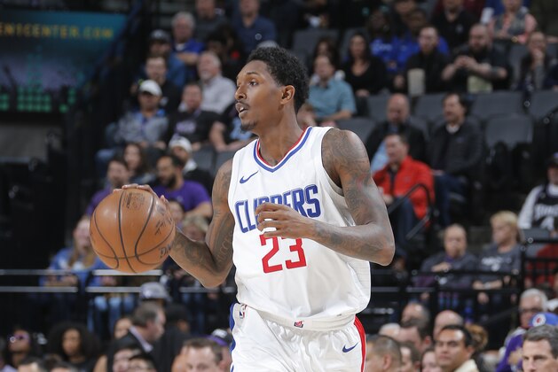 SACRAMENTO, CA - JANUARY 11: Lou Williams #23 of the LA Clippers handles the ball against the Sacramento Kings on January 11, 2018 at Golden 1 Center in Sacramento, California. NOTE TO USER: User expressly acknowledges and agrees that, by downloading and or using this Photograph, user is consenting to the terms and conditions of the Getty Images License Agreement. Mandatory Copyright Notice: Copyright 2018 NBAE (Photo by Rocky Widner/NBAE via Getty Images)