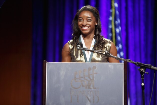 NEW YORK, NY - SEPTEMBER 25: GSLD Honoree Simone Biles speaks onstage at the 32nd Annual Great Sports Legends Dinner To Benefit The Miami Project/Buoniconti Fund To Cure Paralysis at New York Hilton Midtown on September 25, 2017 in New York City.  (Photo by Thos Robinson/Getty Images for The Buoniconti Fund to Cure Paralysis )