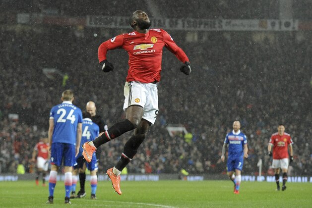 Manchester United's Romelu Lukaku celebrates after scoring his sides 3ed goal of the game during the English Premier League soccer match between Manchester United and Stoke City at Old Trafford in Manchester, England, Monday, Jan. 15, 2018. (AP Photo/Rui Vieira)