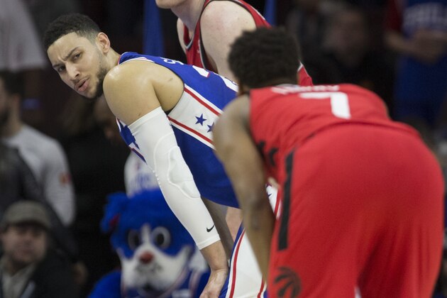 PHILADELPHIA, PA - JANUARY 15: Ben Simmons #25 of the Philadelphia 76ers argues with Kyle Lowry #7 of the Toronto Raptors in the final moments of the game at the Wells Fargo Center on January 15, 2018 in Philadelphia, Pennsylvania. The 76ers defeated the Raptors 117-111. NOTE TO USER: User expressly acknowledges and agrees that, by downloading and or using this photograph, User is consenting to the terms and conditions of the Getty Images License Agreement. (Photo by Mitchell Leff/Getty Images)
