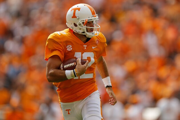 KNOXVILLE, TN - OCTOBER 14:  Quinten Dormady #12 of the Tennessee Volunteers runs with the ball against the South Carolina Gamecocks at Neyland Stadium on October 14, 2017 in Knoxville, Tennessee.  (Photo by Michael Reaves/Getty Images)