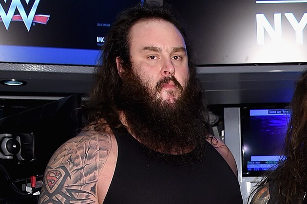 NEW YORK, NY - MARCH 29:  WWE Superstars Braun Strowman, Bray Wyatt and Erick Rowan ring The New York Stock Exchange Opening Bell in honor of WrestleMania 32  at New York Stock Exchange on March 29, 2016 in New York City.  (Photo by Jamie McCarthy/Getty Images)