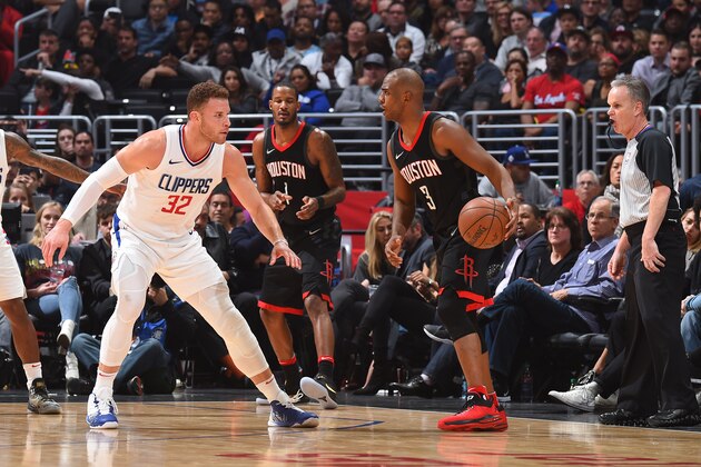 LOS ANGELES, CA - JANUARY 15: Chris Paul #3 of the Houston Rockets handles the ball against Blake Griffin #32 of the LA Clippers on January 15, 2018 at STAPLES Center in Los Angeles, California. NOTE TO USER: User expressly acknowledges and agrees that, by downloading and/or using this Photograph, user is consenting to the terms and conditions of the Getty Images License Agreement. Mandatory Copyright Notice: Copyright 2018 NBAE (Photo by Andrew D. Bernstein/NBAE via Getty Images)