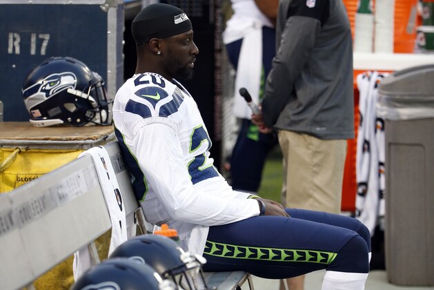 Seattle Seahawks cornerback Jeremy Lane sits as the national anthem plays before a preseason NFL football game against the Oakland Raiders, Thursday, Sept. 1, 2016, in Oakland, Calif. (AP Photo/Tony Avelar)