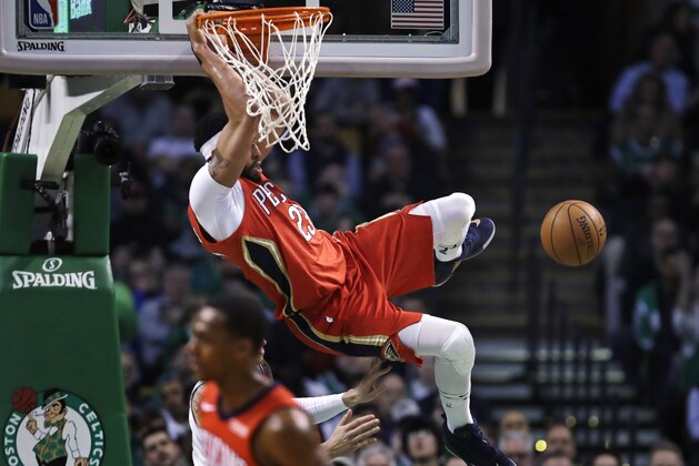 New Orleans Pelicans forward Anthony Davis slams a dunk during the first quarter of an NBA basketball game against the Boston Celtics in Boston, Tuesday, Jan. 16, 2018. (AP Photo/Charles Krupa)
