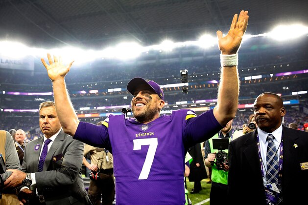 MINNEAPOLIS, MN - JANUARY 14:  Quarterback Case Keenum #7 of the Minnesota Vikings celebrates as he walks off the field after the Vikings defeated the New Orleans Saints 29-24 to win the NFC divisional round playoff game at U.S. Bank Stadium on January 14, 2018 in Minneapolis, Minnesota.  (Photo by Jamie Squire/Getty Images)