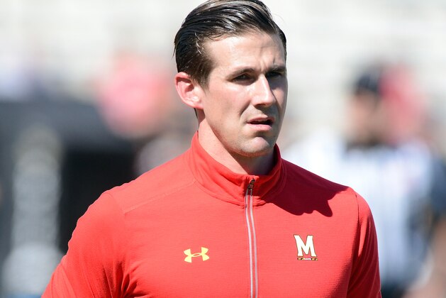 COLLEGE PARK, MD - SEPTEMBER 23:  Offensive Coordinator Walt Bell of the Maryland Terrapins watches the teams warm up before the game against the UCF Knights on September 23, 2017 in College Park, Maryland.  (Photo by G Fiume/Maryland Terrapins/Getty Images)