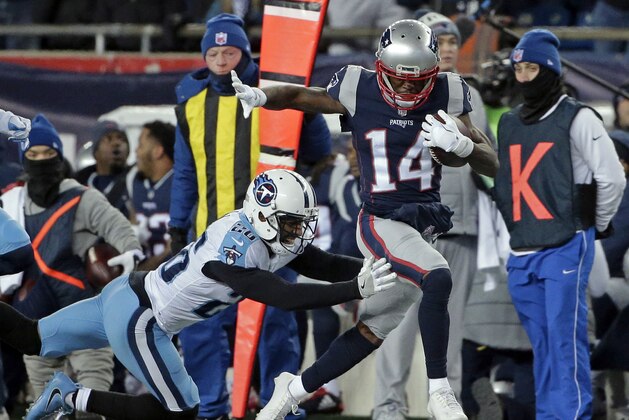 Tennessee Titans cornerback Logan Ryan, left, chases down New England Patriots wide receiver Brandin Cooks (14) after he caught a pass during the first half of an NFL divisional playoff football game, Saturday, Jan. 13, 2018, in Foxborough, Mass. (AP Photo/Steven Senne)