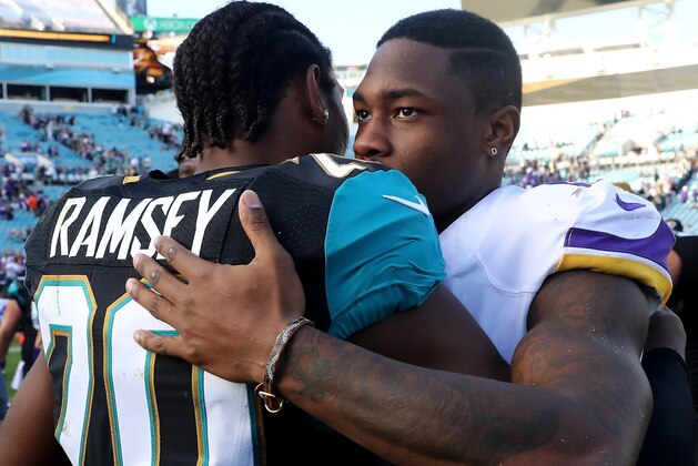 JACKSONVILLE, FL - DECEMBER 11:   Jalen Ramsey #20 of the Jacksonville Jaguars and Stefon Diggs
of the Minnesota Vikings embrace after the game at EverBank Field on December 11, 2016 in Jacksonville, Florida.  (Photo by Sam Greenwood/Getty Images)