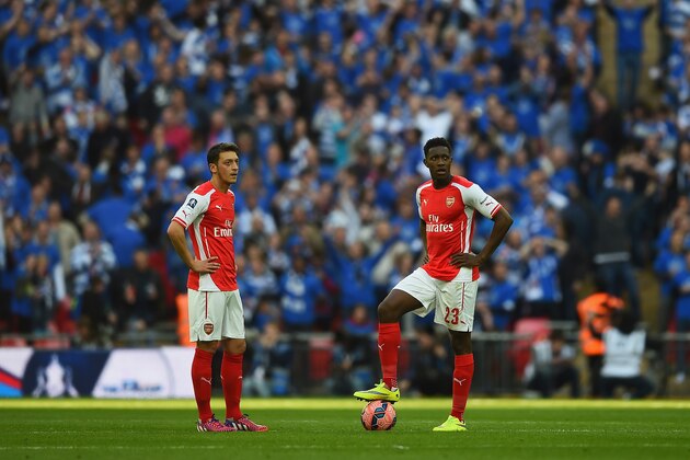 LONDON, ENGLAND - APRIL 18:  Mesut Oezil of Arsenal and Danny Welbeck of Arsenal look on after Reading scored their first goal during the FA Cup Semi Final between Arsenal and Reading at Wembley Stadium on April 18, 2015 in London, England.  (Photo by Laurence Griffiths/Getty Images)