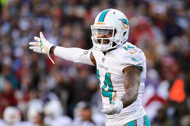 FOXBORO, MA - NOVEMBER 26:  Jarvis Landry #14 of the Miami Dolphins reacts during the fourth quarter of a game against the New England Patriots at Gillette Stadium on November 26, 2017 in Foxboro, Massachusetts.  (Photo by Jim Rogash/Getty Images)