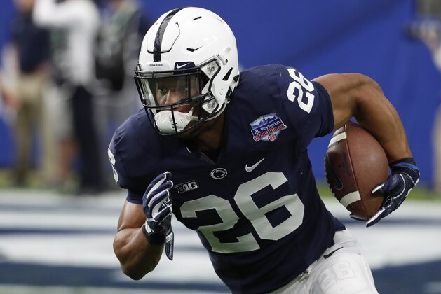 Penn State running back Saquon Barkley (26) against Washington during the Fiesta Bowl NCAA college football game, Saturday, Dec. 30, 2017, in Glendale, Ariz. (AP Photo/Rick Scuteri)