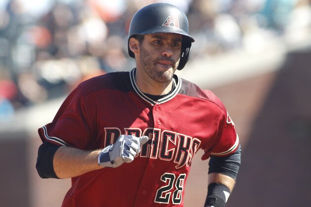 Arizona Diamondbacks' J.D. Martinez rounds the bases after hitting a two-run home run against the San Francisco Giants during the sixth inning of a baseball game, Sunday, Sept. 17, 2017, in San Francisco. Paul Goldschmidt scored on the home run. (AP Photo/George Nikitin)