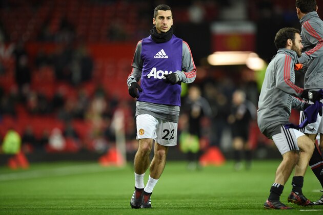 Manchester United's Armenian midfielder Henrikh Mkhitaryan warms up ahead of the English Premier League football match between Manchester United and Southampton at Old Trafford in Manchester, north west England, on December 30, 2017. / AFP PHOTO / Oli SCARFF / RESTRICTED TO EDITORIAL USE. No use with unauthorized audio, video, data, fixture lists, club/league logos or 'live' services. Online in-match use limited to 75 images, no video emulation. No use in betting, games or single club/league/player publications. / (Photo credit should read OLI SCARFF/AFP/Getty Images) Manchester United's Armenian midfielder Henrikh Mkhitaryan warms up ahead of the English Premier League football match between Manchester United and Southampton at Old Trafford in Manchester, north west England, on December 30, 2017. / AFP PHOTO / Oli SCARFF / RESTRICTED TO EDITORIAL USE. No use with unauthorized audio, video, data, fixture lists, club/league logos or 'live' services. Online in-match use limited to 75 images, no video emulation. No use in betting, games or single club/league/player publications. / (Photo credit should read OLI SCARFF/AFP/Getty Images)