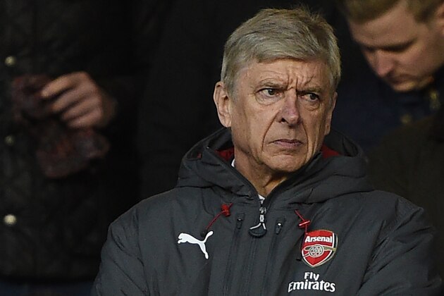Arsenal's French manager Arsene Wenger looks on from the stands during the English FA Cup third round football match between Nottingham Forest and Arsenal at The City Ground in Nottingham, central England, on January 7, 2018. / AFP PHOTO / Oli SCARFF / RESTRICTED TO EDITORIAL USE. No use with unauthorized audio, video, data, fixture lists, club/league logos or 'live' services. Online in-match use limited to 75 images, no video emulation. No use in betting, games or single club/league/player publications.  /         (Photo credit should read OLI SCARFF/AFP/Getty Images)