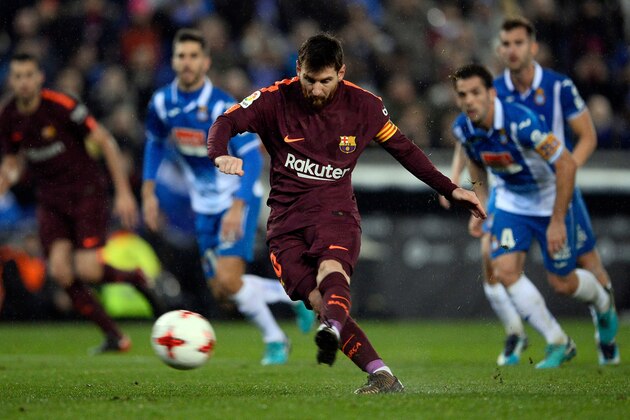Barcelona's Argentinian forward Lionel Messi shoots a penalty kick to miss a goal during the Spanish 'Copa del Rey' (King's cup) quarter-final first leg football match between RCD Espanyol and FC Barcelona at the RCDE Stadium in Cornella de Llobregat on January 17, 2018. / AFP PHOTO / Josep LAGO        (Photo credit should read JOSEP LAGO/AFP/Getty Images)