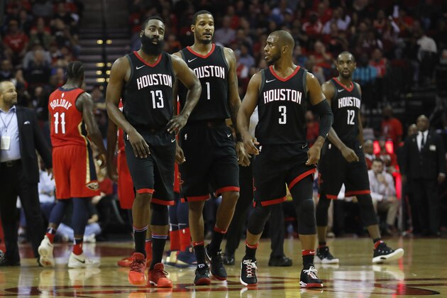 HOUSTON, TX - DECEMBER 11:  James Harden #13 of the Houston Rockets, Chris Paul #3, and Trevor Ariza #1 react after a techical foul in the first half against the New Orleans Pelicans at Toyota Center on December 11, 2017 in Houston, Texas.  NOTE TO USER: User expressly acknowledges and agrees that, by downloading and or using this photograph, User is consenting to the terms and conditions of the Getty Images License Agreement.  (Photo by Tim Warner/Getty Images)